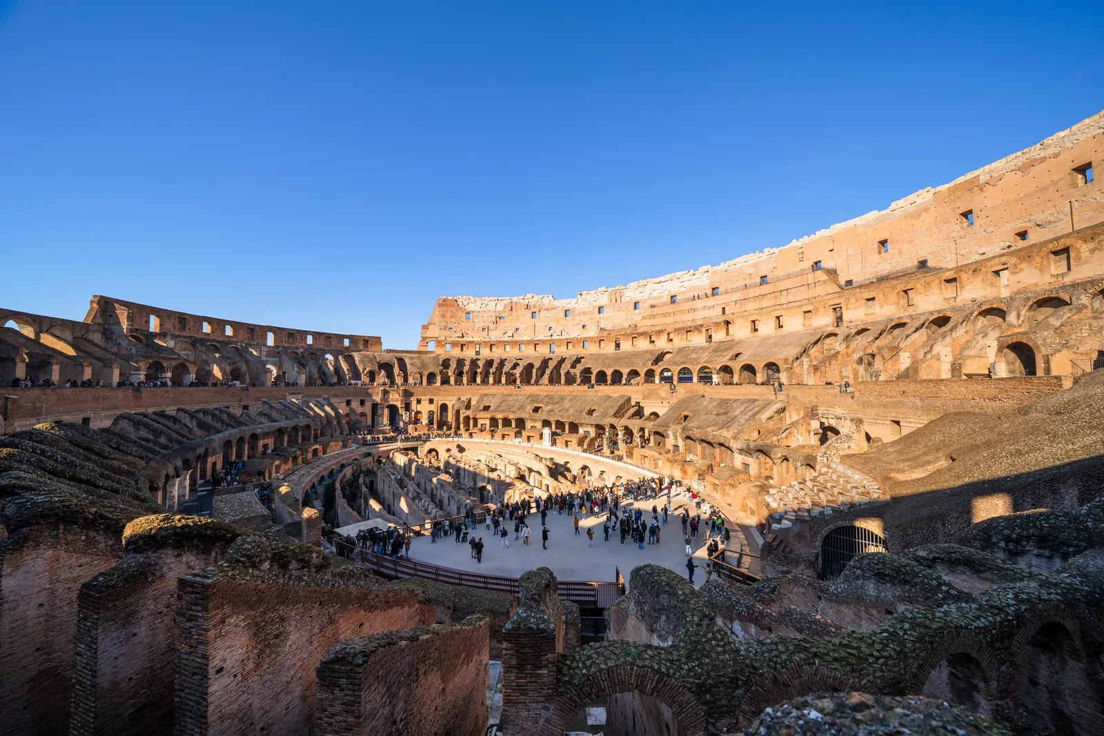 The tiers of the Colosseum rising above the arena
